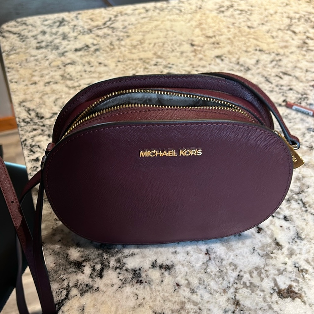 Michael Kors Plum Saffiano Leather Oval Crossbody Bag with Gold Hardware